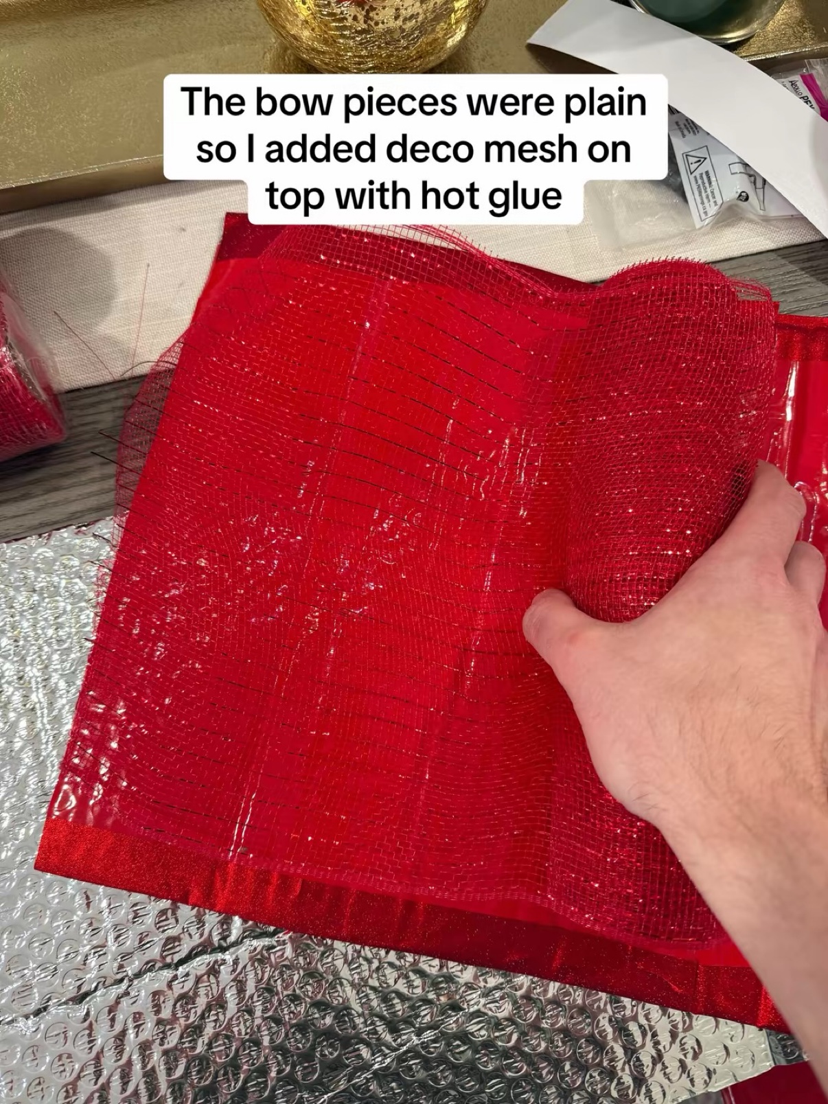 Red deco mesh glued onto a bow piece