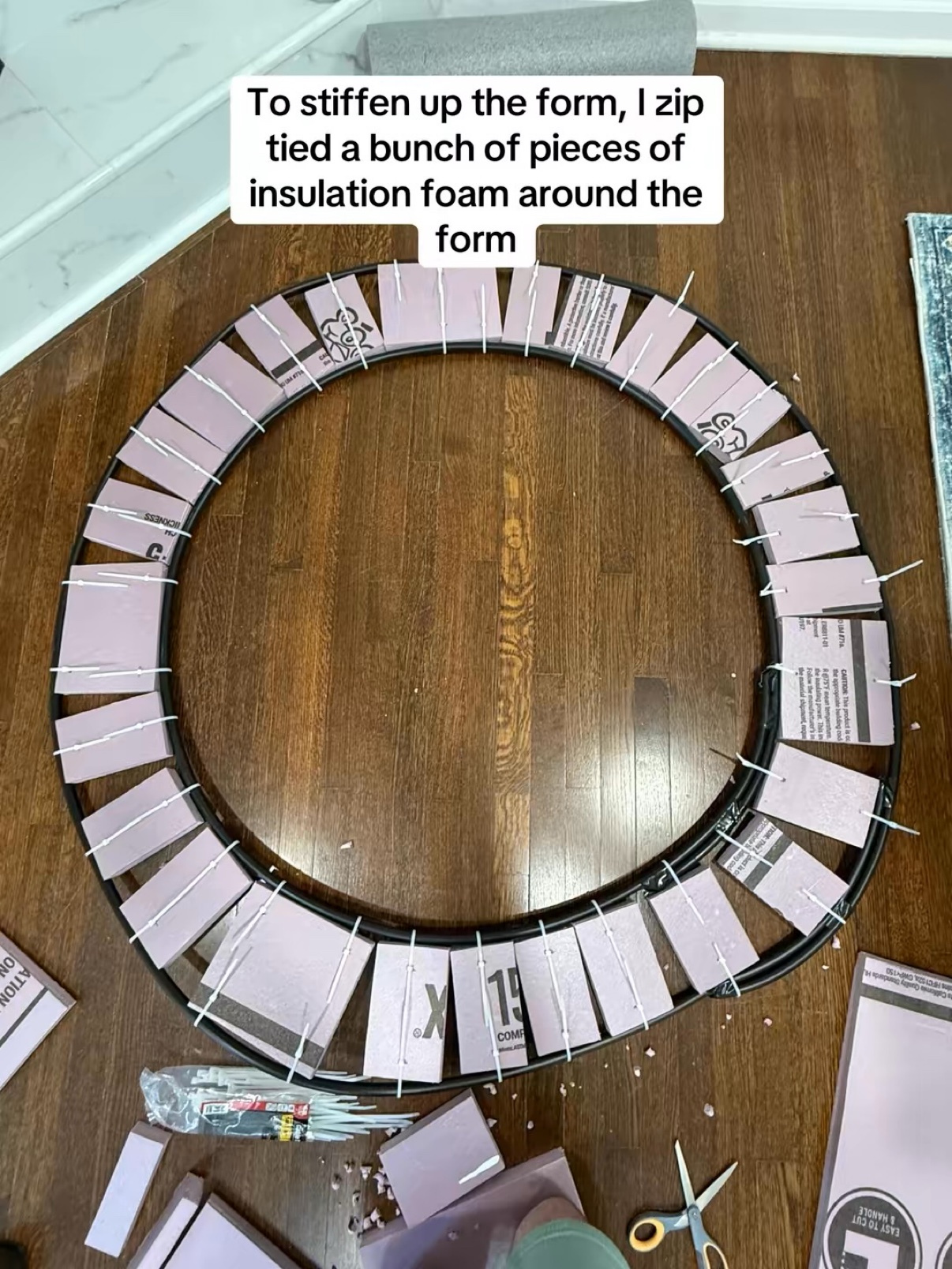 Insulation foam pieces zip tied around the wreath form
